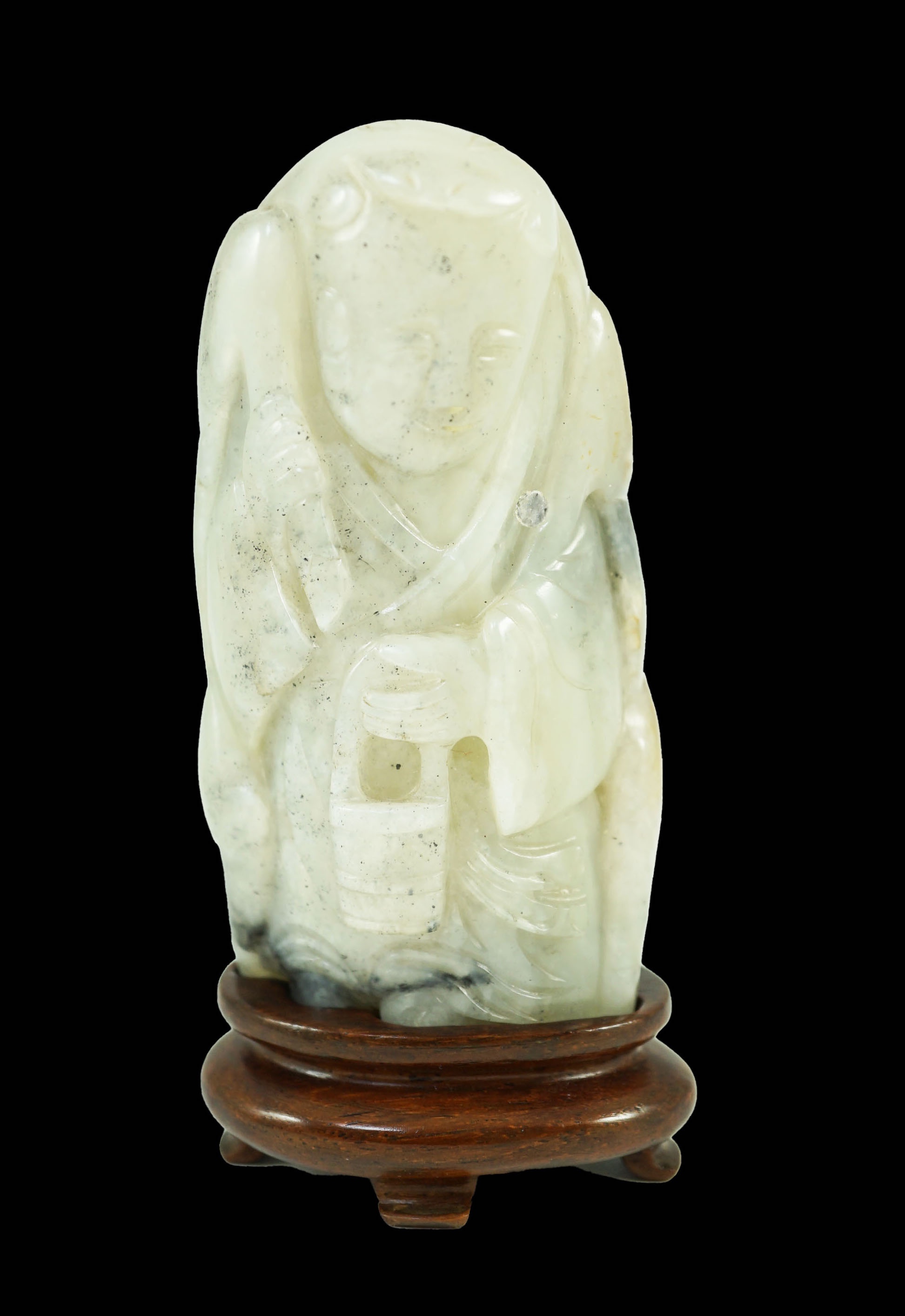 A Chinese white, grey and russet jade figure of Zhou Yanzi, Ming dynasty, 8.5cm high, Filled hole to figure, wood stand